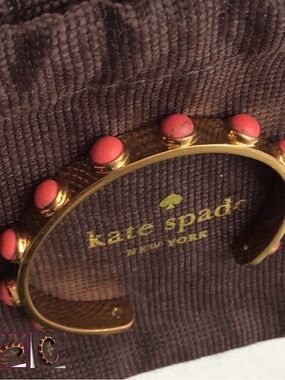kate spade Gold Tone Cuff Bracelet with Coral Pink Cabochons